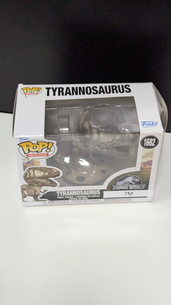 Figura Funko Pop de Tyrannosaurus en caja.