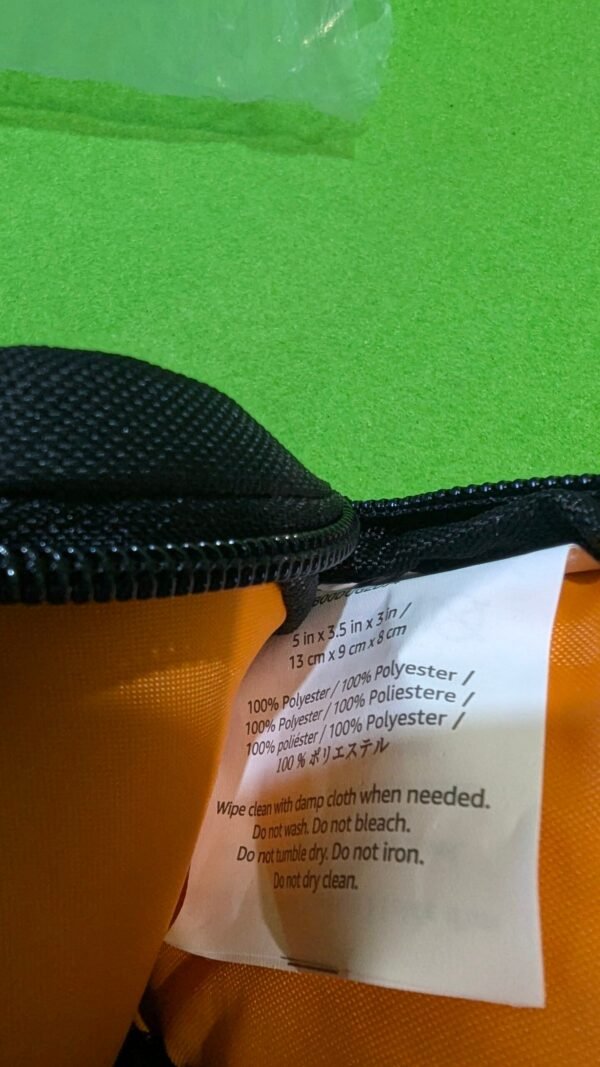 Etiqueta de cuidado de bolsa de poliéster.