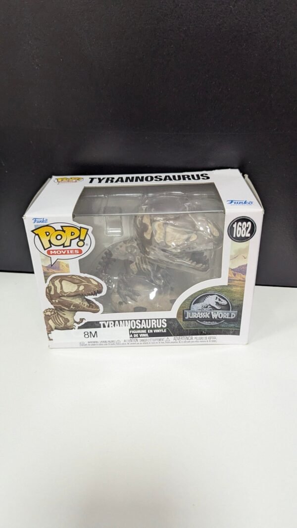 Figura Funko Pop Tirannosaurio en caja.