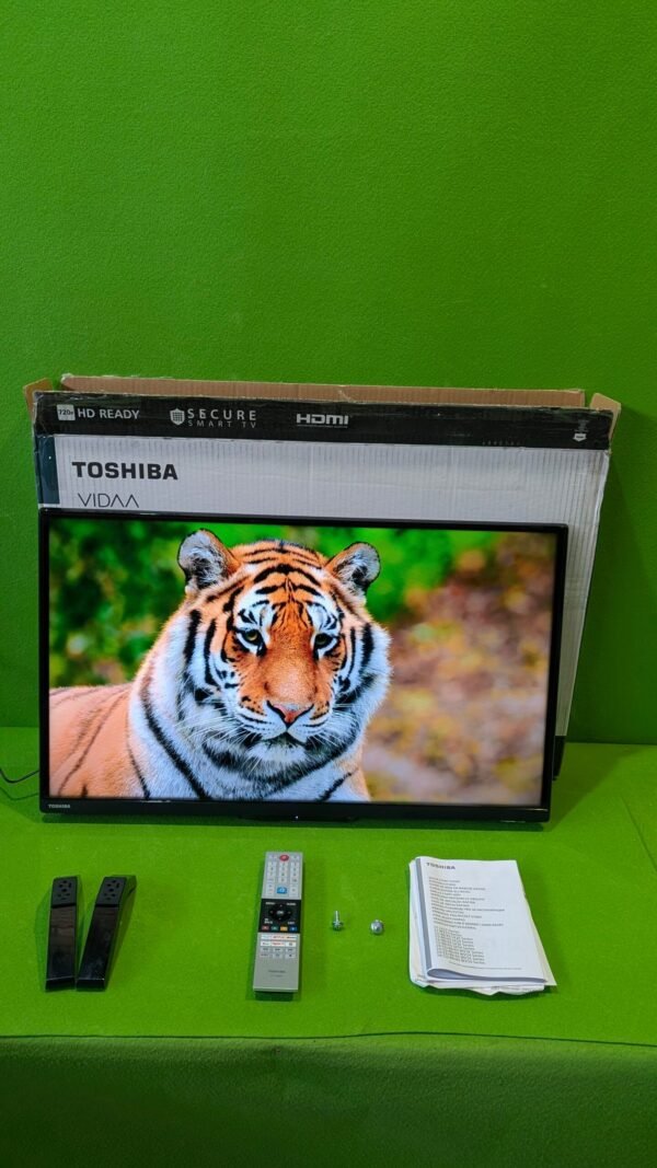 Televisor Toshiba con imagen de tigre en pantalla.