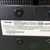 Parte trasera de televisor Toshiba, especificaciones y advertencias.