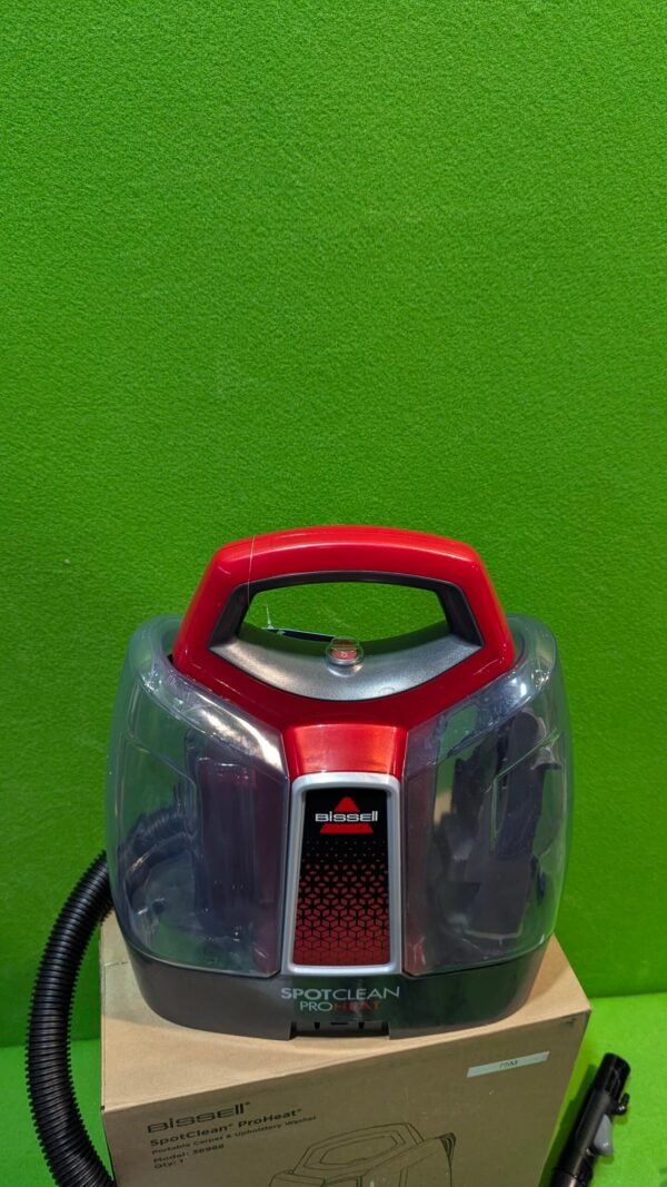 Aspiradora Bissell SpotClean ProHeat sobre caja de cartón.