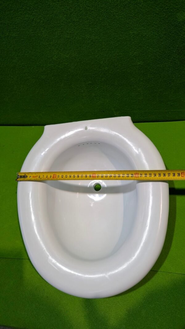 PXL_20260111_163836640-scaled-1.jpg Bidé portátil Acoplable al inodoro Sin tapón De plástico
