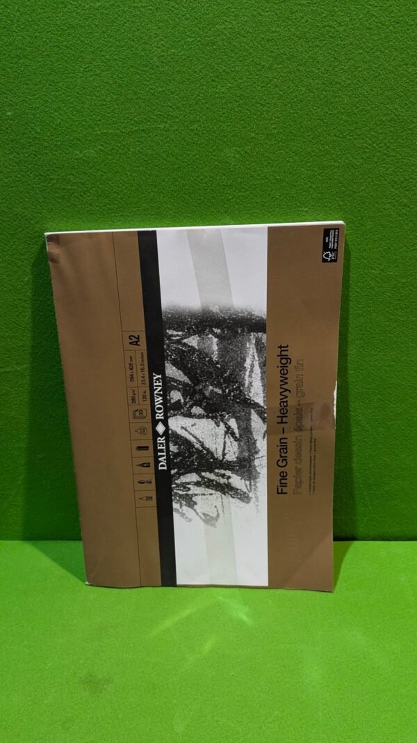 Bloc dibujo de grano fino sobre fondo verde.