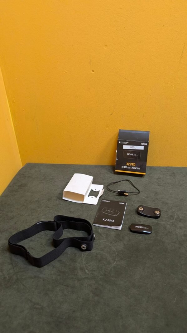 Monitor de frecuencia cardíaca X2 Pro con caja y accesorios.