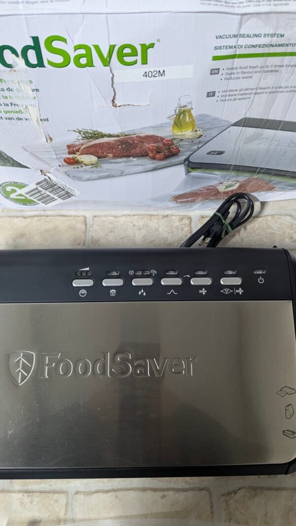 Foodsaver Envasadora al Vacío con almacenamiento de rollos integrado