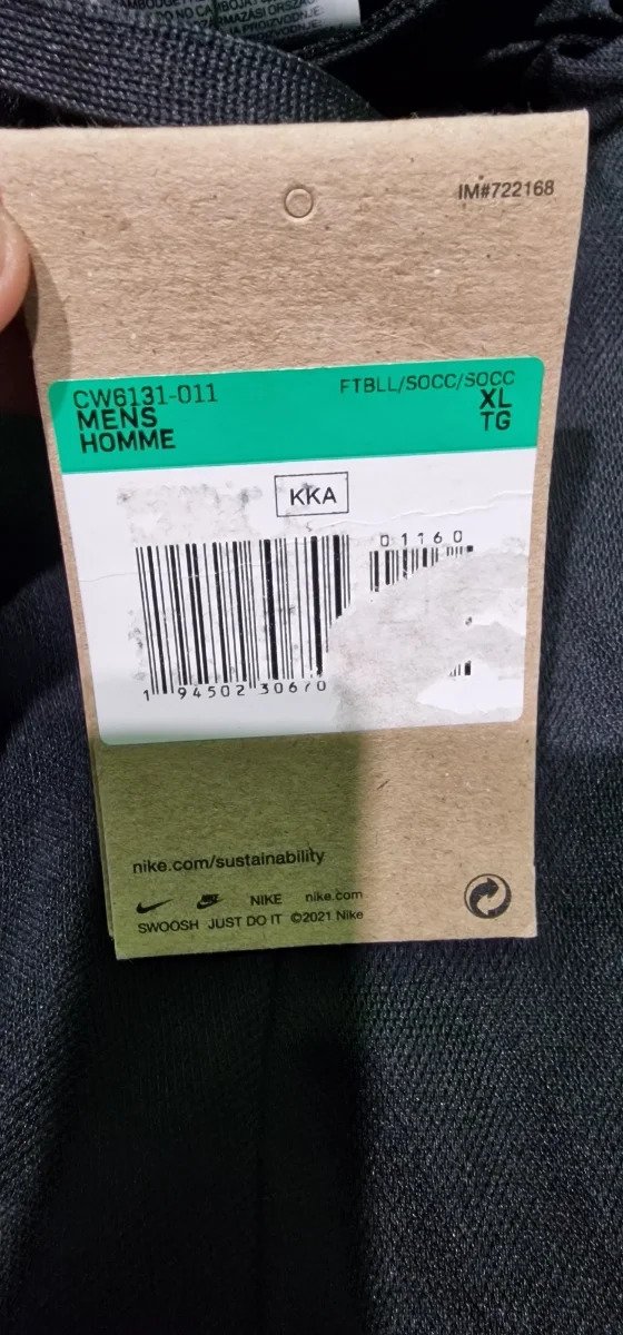 Etiqueta de ropa Nike para hombre, talla XL.
