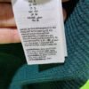 Etiqueta de ropa, tallas y composición.