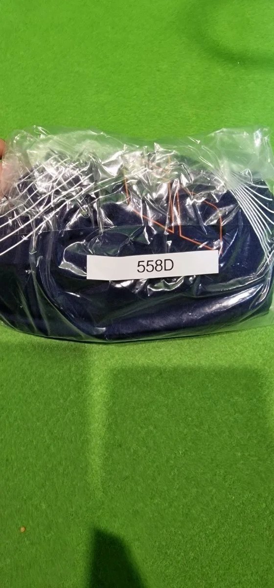 i5106881844.webp Bolso azul empaquetado con etiqueta 558D