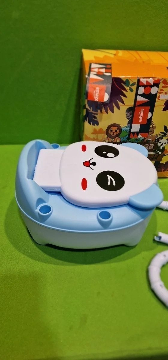 Orinal para niños y cepillo de limpieza