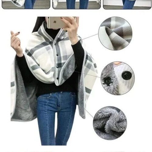 Manta suéter de lana a cuadros gris y blanco.