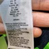 Etiqueta de ropa, composición 92% poliéster, 8% elastano.