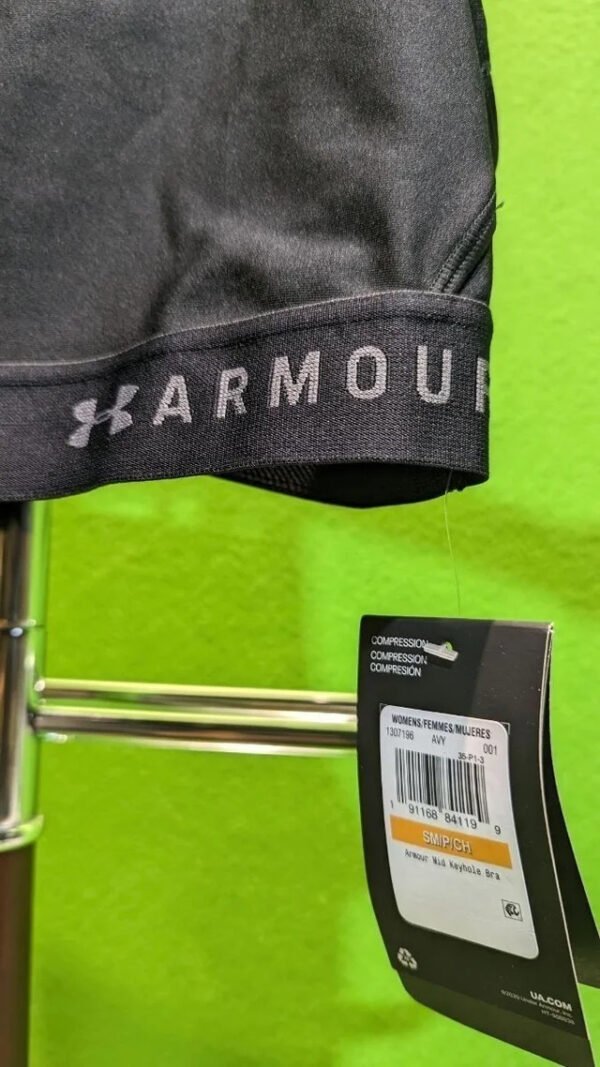 Sujetador deportivo Armour negro con etiqueta colgante